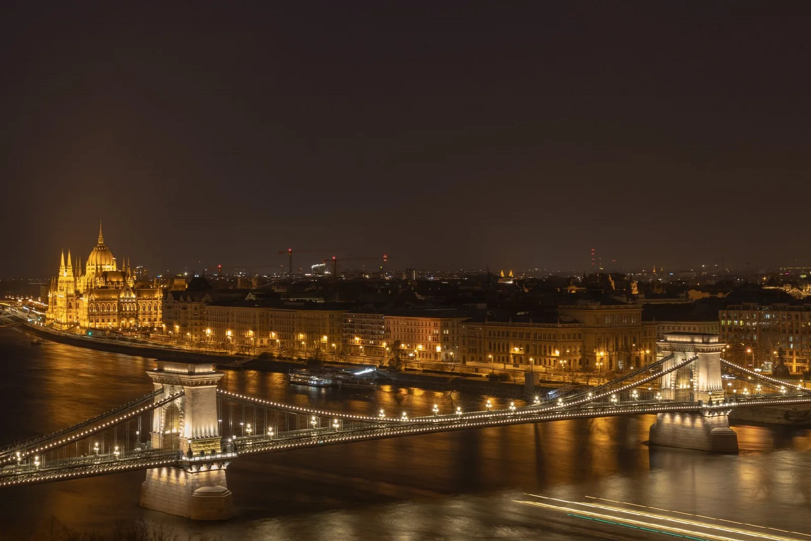 Budapest’s illuminated Chain Bridge, Danube River and Parliament at night