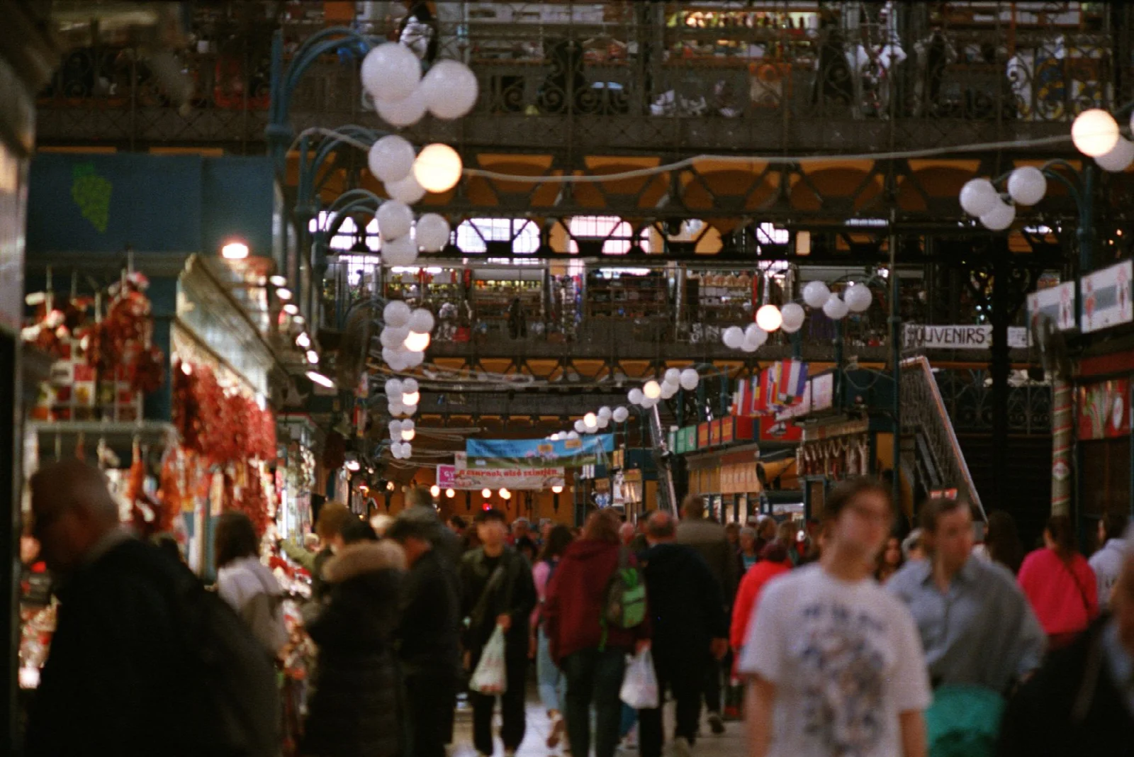 Stalls and visitors shopping inside Budapest’s Central Market Hall