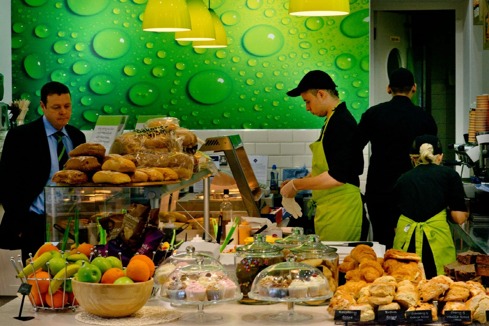 Baked goods and fresh fruit on the counter of a café in Dublin
