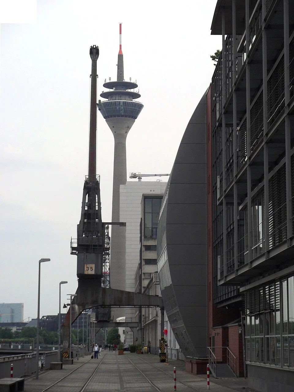 Harbour crane and Rheinturm around Düsseldorf’s MedienHafen, photographed in May 2011.
