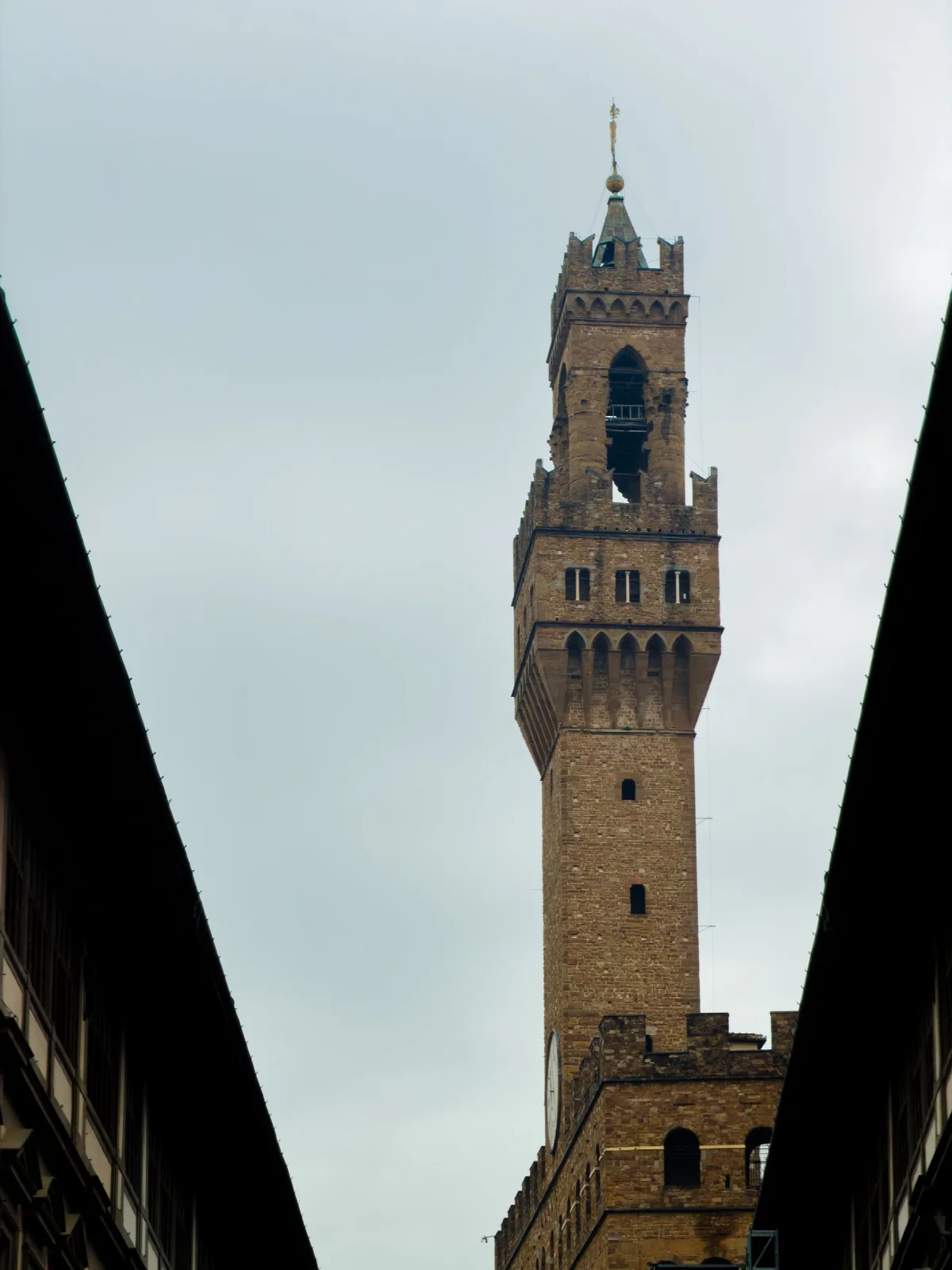 The stone tower of Palazzo Vecchio and surrounding buildings in Florence