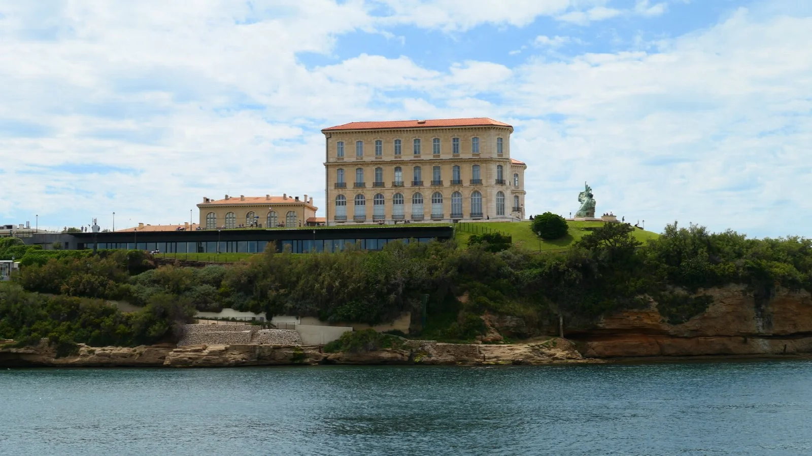 Palais du Pharo surrounded by greenery on the Marseille waterfront