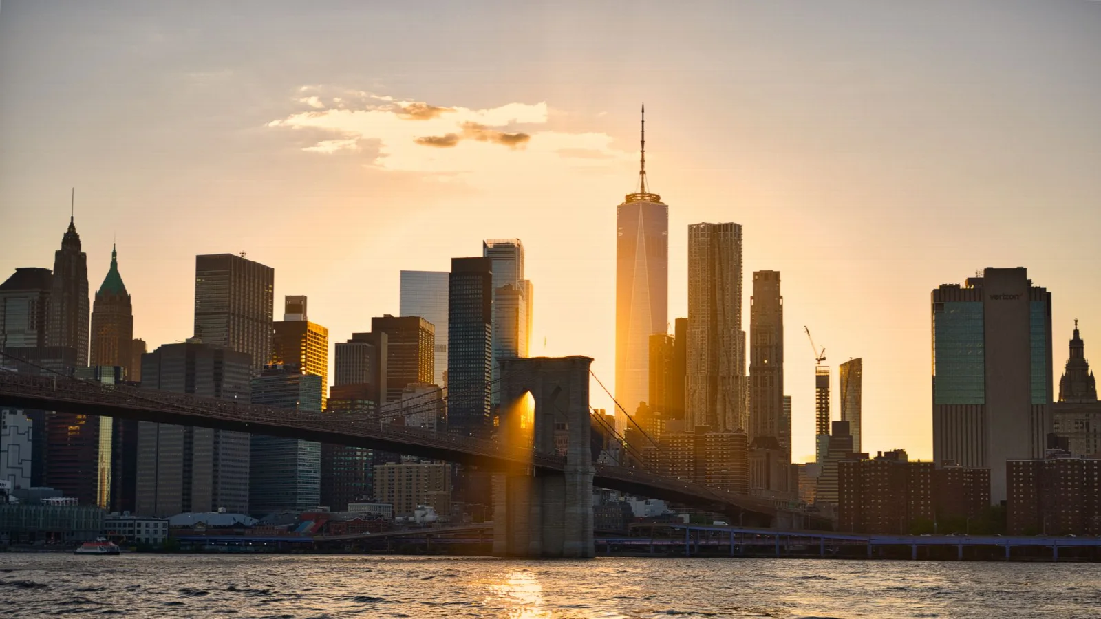 Brooklyn Bridge and the Manhattan skyline in New York at sunset