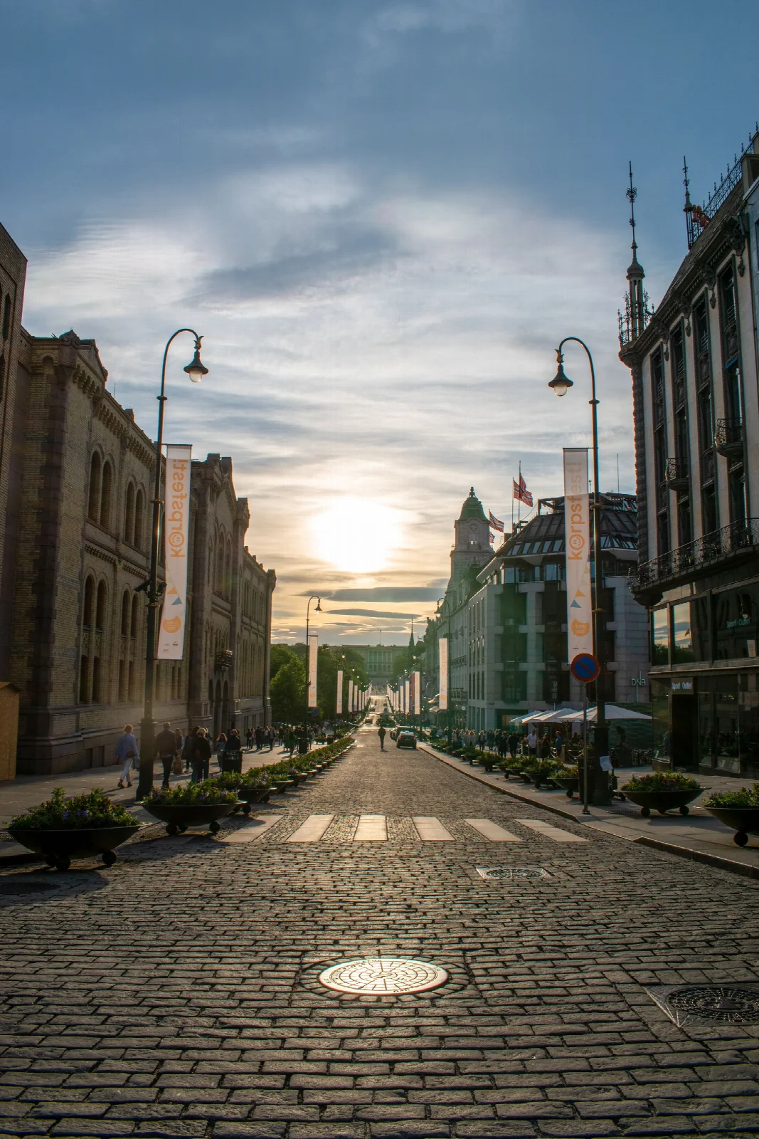 A paved pedestrian street and historic façades in central Oslo