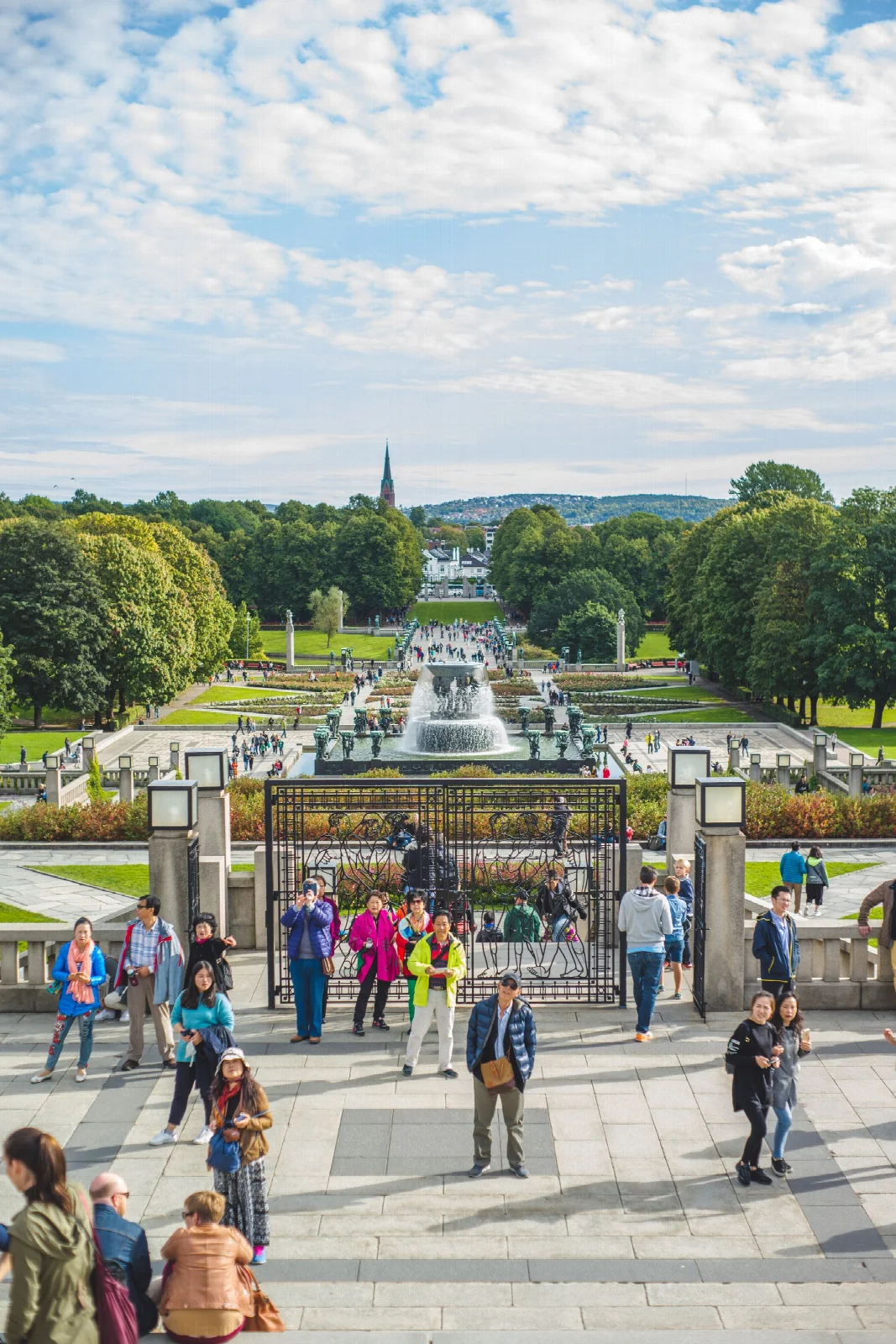 Green spaces, sculptures and visitors walking in Oslo’s Vigeland Park